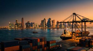 Doha skyline and port at dusk representing Qatar's import-dependent rice trade and distribution network.