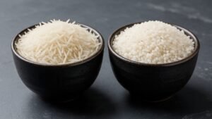 Two bowls of white rice comparing Vietnamese and Pakistani varieties side by side
