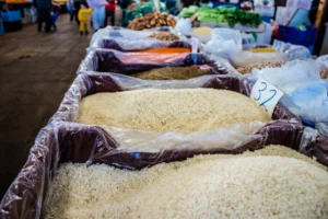 Open sacks of Super Kernel Basmati rice lined up at a rice market